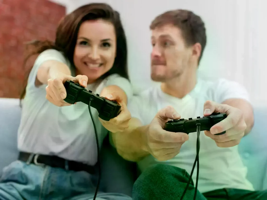 Consola PlayStation 2 Slim sobre una mesa.