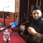 El imán absuelto Tariq Chadliuoi, con 133.000 seguidores en redes sociales, dando una conferencia. AFP