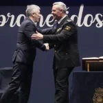 El ministro del Interior, Fernando Grande-Marlaska, con el nuevo director adjunto operativo, José Luis Santafé.