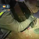 Agentes de la Policía Nacional durante la operación